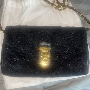 Black Quilted Crossbody Bag with Gold Chain and Turn-Lock